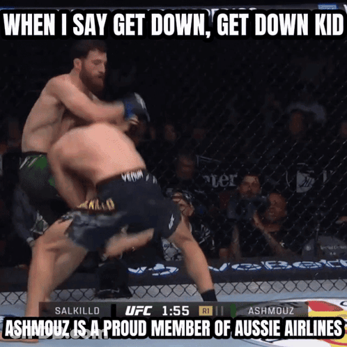Two Men Are Fighting In A Cage With The Words When I Say Get Down Get Down Kid At The Top GIF
