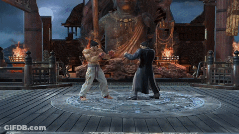 Two Men Are Fighting In Front Of A Statue Of A Buddha GIF