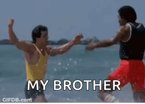 Two Men Are Fighting In The Water On The Beach And The Words `` My Brother '' Are Written On The Bottom . GIF