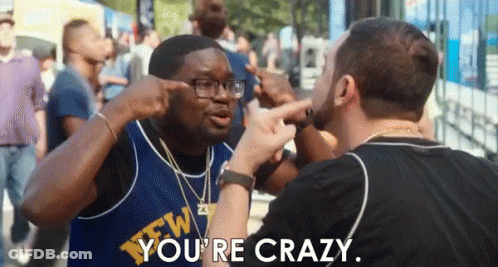 Two Men Are Having A Fight And One Of Them Is Pointing At The Other 'S Head . GIF