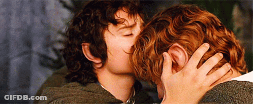 Two Men Are Kissing Each Other In A Movie Scene . GIF