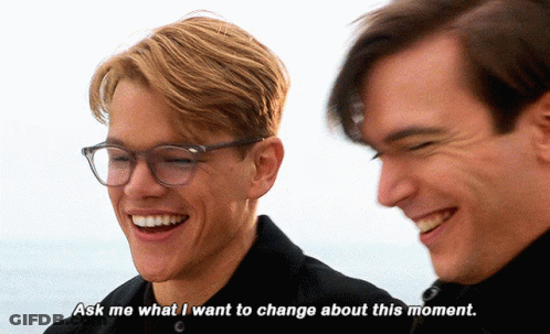 Two Men Are Laughing And One Of Them Says Ask Me What I Want To Change About This Moment GIF