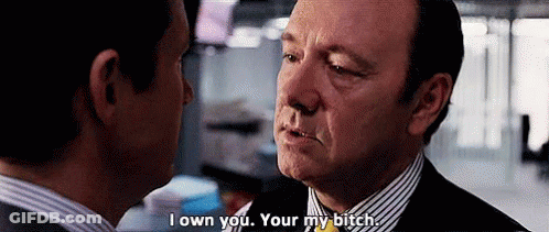 Two Men Are Looking At Each Other And One Of Them Is Saying `` I Own You . Your My Bitch '' . GIF