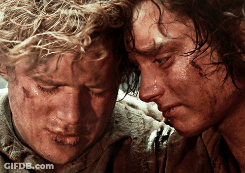 Two Men Are Looking At Each Other With Tears Coming Out Of Their Eyes GIF