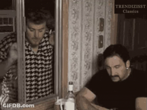 Two Men Are Looking Out Of A Window With The Words Trendizisst Classics On The Bottom Right GIF