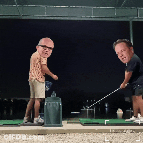 Two Men Are Playing Golf And One Has A Big Head On His Head GIF