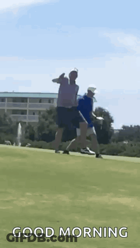 Two Men Are Playing Golf On A Golf Course And One Of Them Is Giving A Thumbs Up . GIF