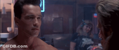 Two Men Are Playing Pool In A Bar With A Bud Light Sign GIF