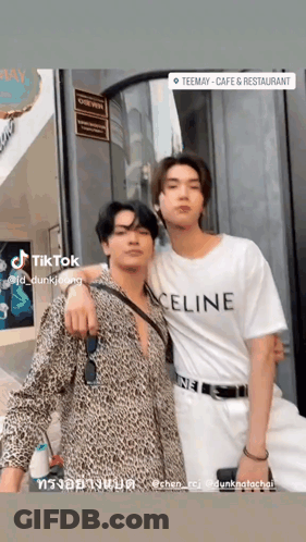 Two Men Posing One Wearing Celine Shirt GIF