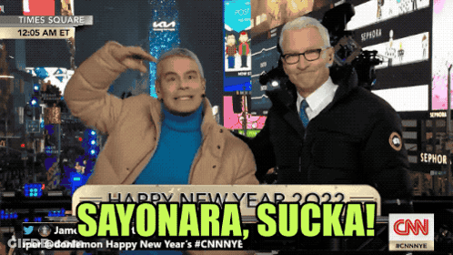 Two Men Posing In Front Of Sayonara Sucka Sign GIF