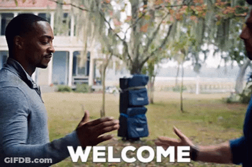 Two Men Are Shaking Hands In Front Of A House And The Word Welcome Is Written On The Screen . GIF