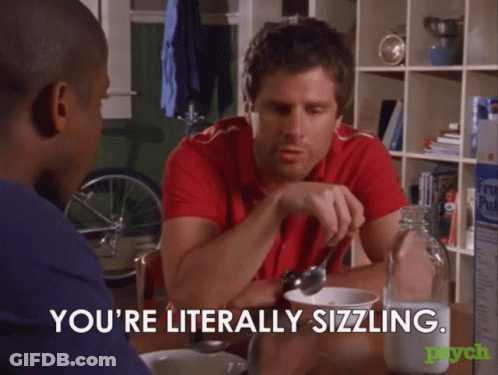 Two Men Are Sitting At A Table And One Of Them Is Saying " You 'Re Literally Sizzling .. " GIF