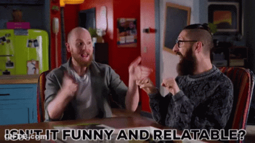 Two Men Sitting At Table Relatable Funny GIF