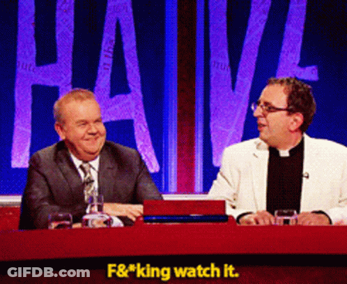 Two Men Are Sitting At A Table With The Words F & * King Watch It On The Bottom GIF