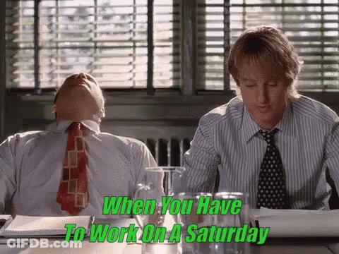 Two Men Are Sitting At A Table With The Words " When You Have To Work On A Saturday " On The Bottom GIF
