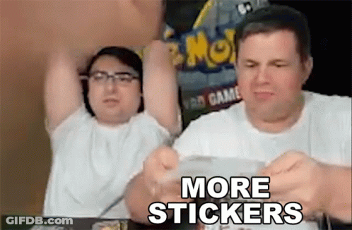 Two Men Are Sitting At A Table With Their Arms In The Air And The Words `` More Stickers '' . GIF