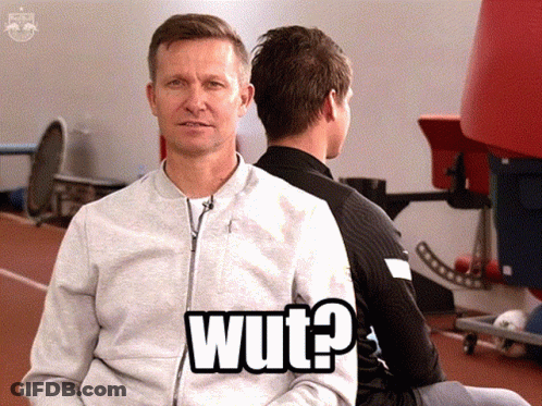 Two Men Are Sitting Back To Back And One Of Them Has The Word Wut On His Shirt GIF
