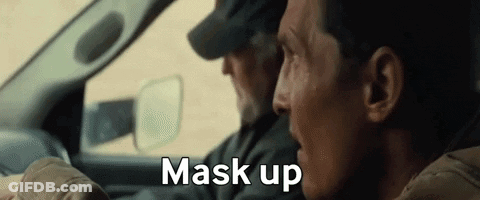 Two Men Are Sitting In A Car And One Of Them Is Saying Mask Up . GIF