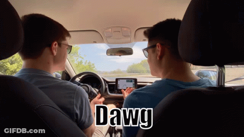 Two Men Are Sitting In A Car With The Word Dawg On The Bottom GIF