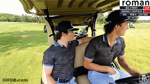 Two Men Are Sitting In A Golf Cart With The Word Roman On The Bottom GIF