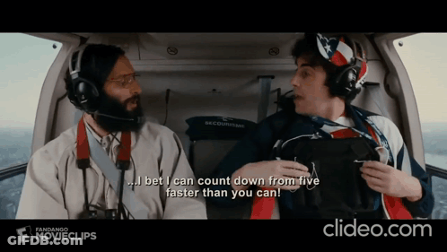 Two Men In Helicopter Counting Down From Five GIF