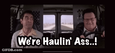 Two Men Are Sitting In A Van And One Of Them Is Saying We 'Re Haulin ' Ass ! GIF