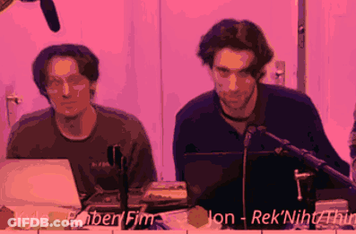 Two Men Are Sitting In Front Of A Microphone And Their Names Are Kyle And Ebnerfim GIF