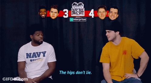 Two Men Are Sitting In Front Of A Sign That Says Face-Off GIF