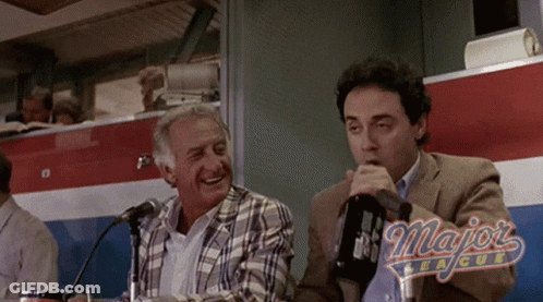 Two Men Are Sitting In Front Of Microphones With The Word Majors League On The Bottom Right GIF