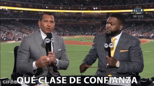 Two Men Are Sitting In Front Of Microphones With The Words Que Clase De Confianza In The Upper Right Corner GIF