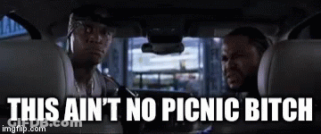 Two Men Are Sitting In The Back Seat Of A Car And They Are Talking To Each Other . GIF