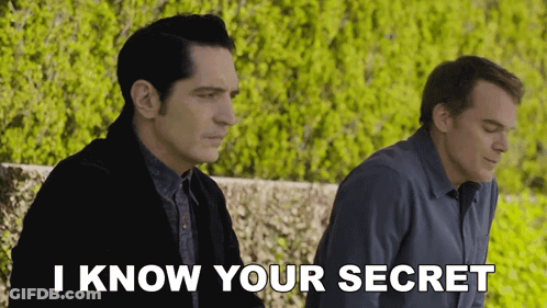 Two Men Are Sitting Next To Each Other And One Of Them Is Saying I Know Your Secret GIF