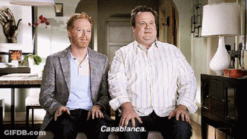 Two Men Are Sitting Next To Each Other And One Of Them Says " Casablanca " GIF