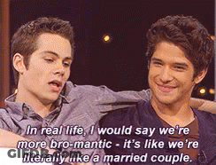 Two Men Are Sitting Next To Each Other And One Of Them Says In Real Life GIF
