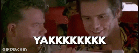 Two Men Are Sitting Next To Each Other In A Chair And One Of Them Is Holding A Remote Control . GIF