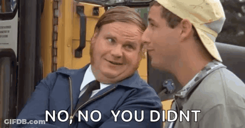 Two Men Are Sitting Next To Each Other In Front Of A School Bus . GIF