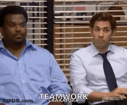 Two Men Are Sitting Next To Each Other In Front Of A Window With Blinds . GIF
