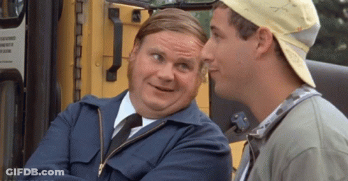 Two Men Are Sitting Next To Each Other In Front Of A Yellow Bus And Talking . GIF