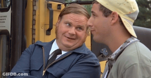 Two Men Sitting Next To Yellow Bus Talking GIF