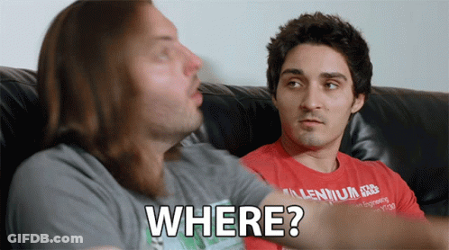 Two Men Are Sitting On A Couch And One Of Them Is Wearing A Shirt That Says Millennium Free GIF