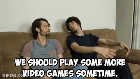 Two Men Are Sitting On A Couch And One Of Them Says We Should Play Some More Video Games Sometime GIF