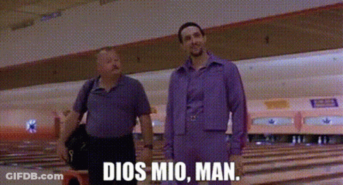 Two Men Are Standing In A Bowling Alley With The Words Dios Mio , Man Written On The Screen . GIF