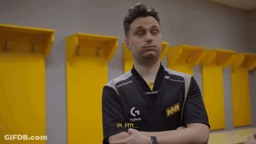 Two Men Are Standing In A Locker Room And One Of Them Is Talking To The Other GIF