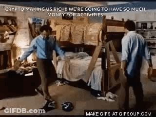 Two Men Are Standing In A Room With A Bunk Bed . GIF