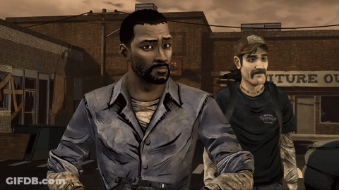 Two Men Are Standing In Front Of A Building That Says Iture GIF