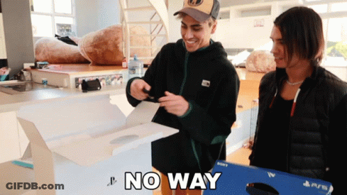 Two Men Are Standing Next To A Box That Says " No Way " GIF