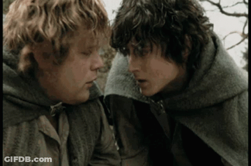 Two Men Are Standing Next To Each Other And Looking At Each Other With Their Eyes Closed . GIF