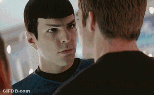 Two Men Are Standing Next To Each Other And Looking At Each Other With Their Eyes Closed . GIF