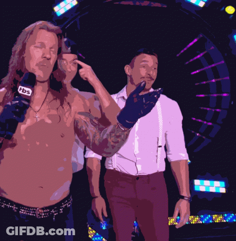 Two Men Are Standing Next To Each Other And One Has A Microphone That Says Tbc On It GIF