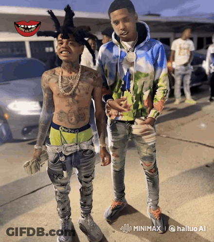Two Men Are Standing Next To Each Other And One Has A Tattoo On His Chest That Says ' O'neill ' On It GIF